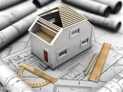 正在搭建的白色房子模型高清图