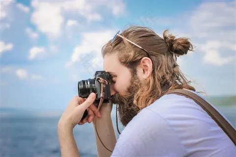 正在摄影的男子素材大图