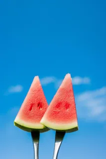 西瓜美食清爽天空蓝色海报背景