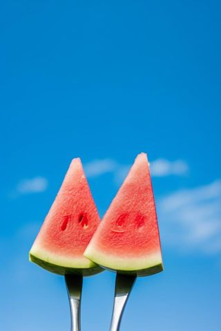 西瓜美食清爽天空蓝色海报背景