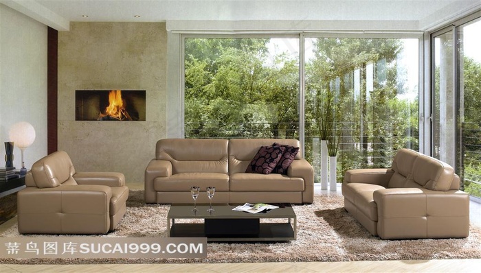 室内的沙发壁炉和落地玻璃窗高清摄影图片