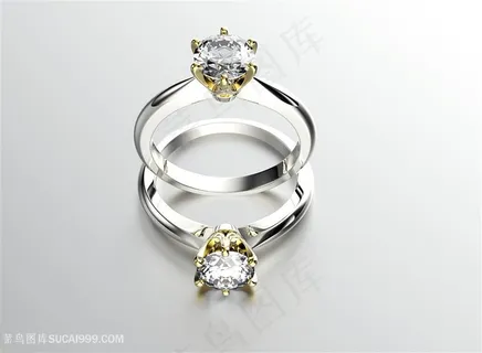 闪耀着光芒的钻石对戒高清摄影图片