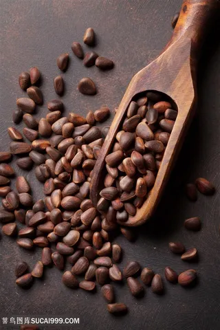 木铲里的优质松子特写摄影高清图片咖啡图片