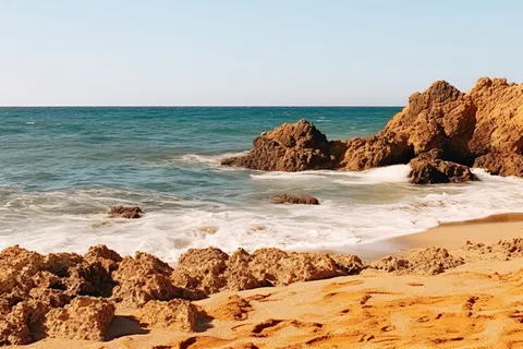 海边海浪沙滩礁石摄影图