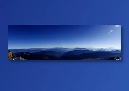 蓝天下连绵起伏的山脉风景图片 蓝天下连绵起伏的山脉风景图片