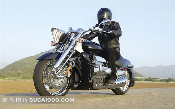 驾驶摩托车的人物摄影