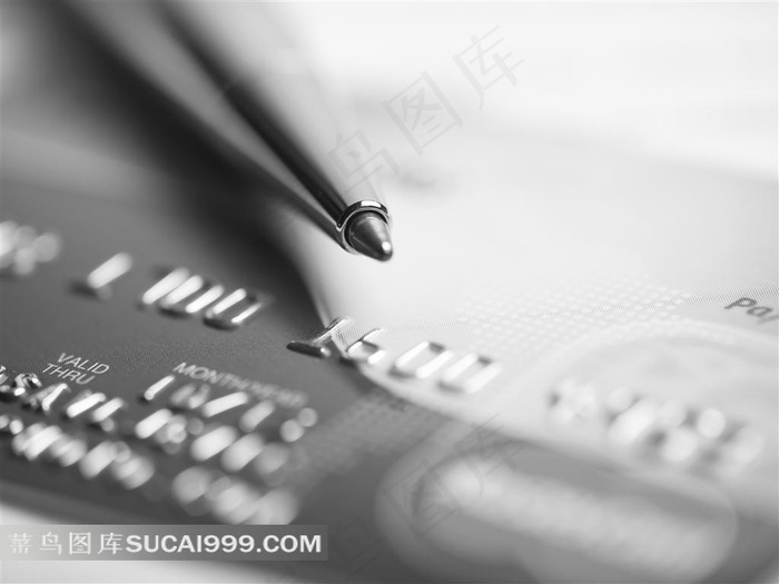 银行卡和圆珠笔特写图片素材