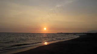 沙滩海面日落图片