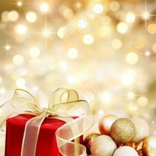 金色光斑背景上的礼物高清图片