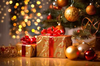 金色圣诞礼盒装饰节日摄影图