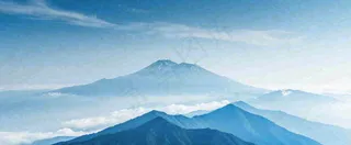 雪山山脉云层云端意境冰山，自然风景冬天蓝天白云摄影图