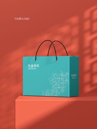 蓝色手提袋红色背景光照样机