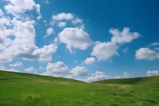 春天的蓝天白云草原很美背景图