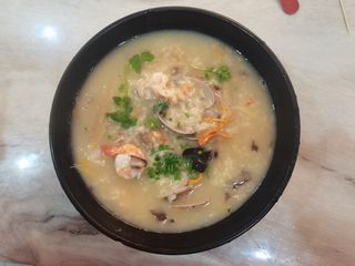 潮汕海鲜粥花甲大虾大闸蟹粥菜品菜谱实拍图片