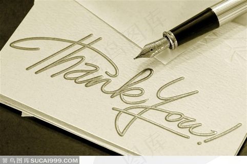 钢笔与贺卡和金色英文字体—高清图片