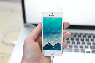 放在桌子上的电脑和手机高清图片