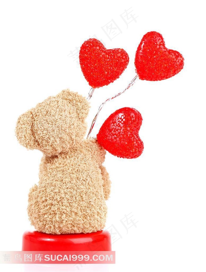 拿心形棒棒糖的毛毛熊艺术摄影高清图片