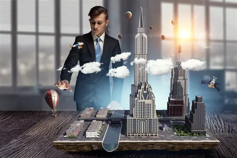穿着西装的男士和桌子上的创意城市建筑高清图片职场人物 穿着西装的男士和桌子上的创意城市建筑高清图片职场人物