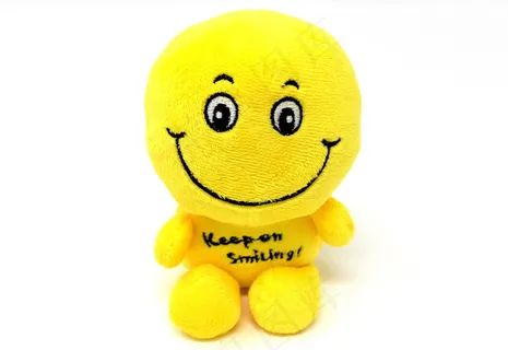 微笑黄色玩具布偶图片