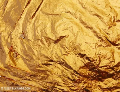 微距金黄色金箔烫金纸背景图片 微距金黄色金箔烫金纸背景图片