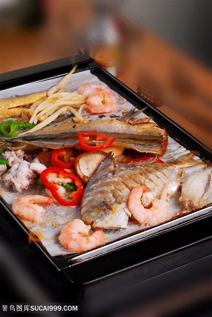 烤盘的美食图片