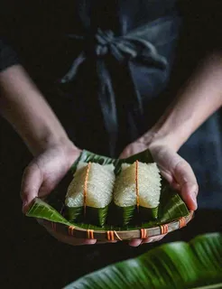 端午节粽子粽叶绿色粽香美食佳节摄影图 端午节粽子粽叶绿色粽香美食佳节摄影图
