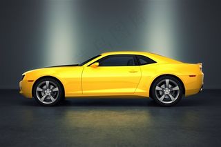 黄色轿车侧面高清图片
