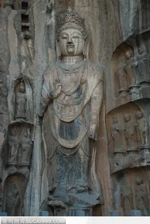 龙门石窟-奉先寺正壁左侧文殊菩萨像 龙门石窟-奉先寺正壁左侧文殊菩萨像