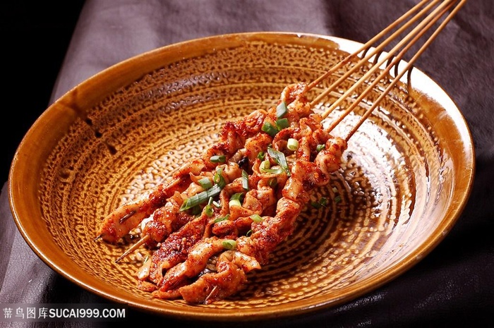 烧烤鸡皮的美食图片