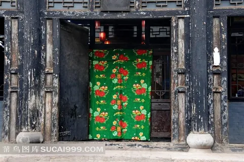 平遥的一处老房子及绿色的门帘