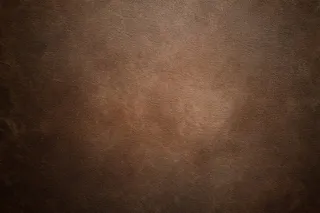 暗棕色牛皮纹理背景高清图片