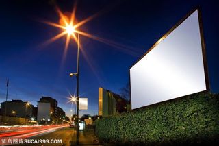 繁华都市夜景之道路旁的户外广告牌