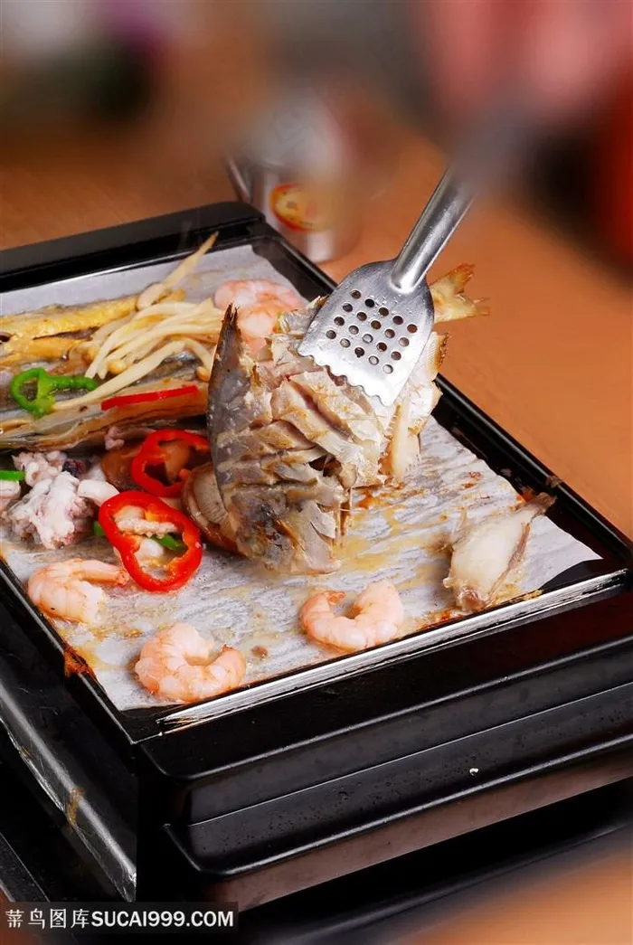 烤盘的美食图片
