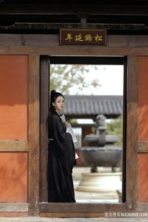 站在门口女扮男装古装清纯美女艺术摄影照片