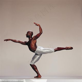 舞蹈动作-单脚站立做滑行姿势的健美先生
