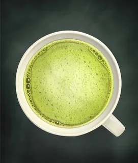 白色杯子里的抹茶饮料高清图片