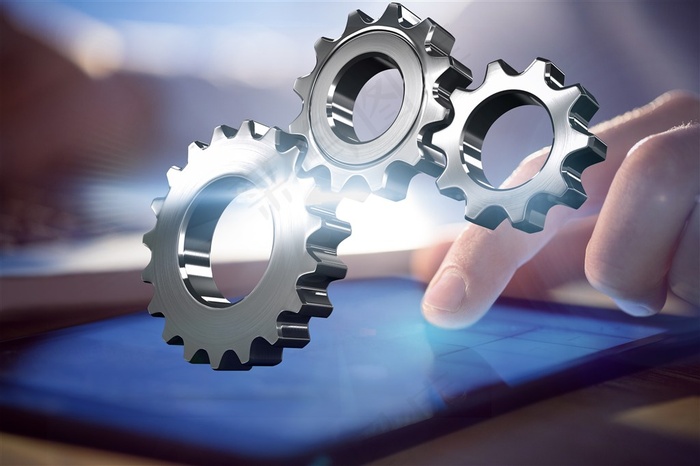 正在看平板电脑的商务人士与轴承