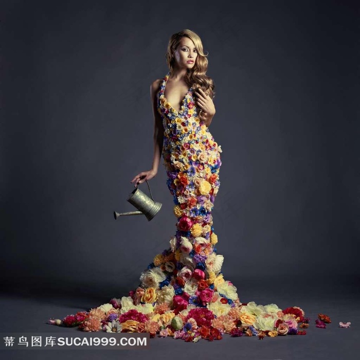 用鲜花点缀的裙装美女摄影高清图片