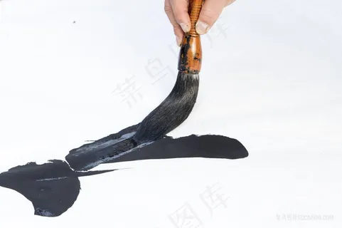 书法家正在写毛笔字的毛笔特写摄影