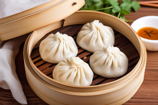 灌汤小笼包美食早点摄影图