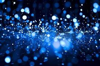 蓝色闪光带有光圈污渍的装饰背景