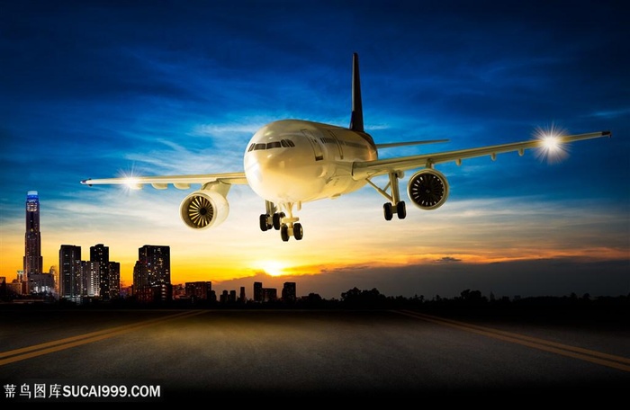 飞机客机与城市景色高清图
