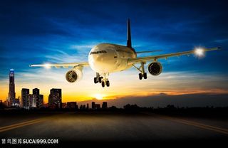 飞机客机与城市景色高清图