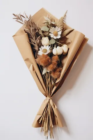 干花花束牛皮纸摄影图