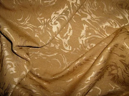 黄色高贵花纹布料背景图片