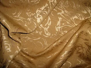 黄色高贵花纹布料背景图片