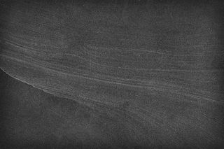 黑板上的粉笔灰纹理背景高清图片