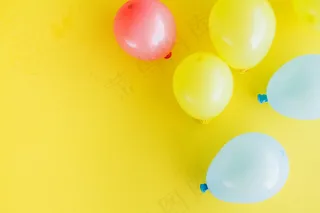 彩色气球黄色背景图片