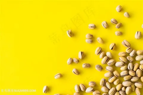 黄色背景开心果图片