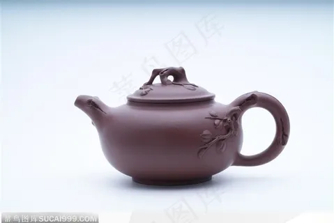 传统茶具-雕刻精美的紫砂壶 传统茶具-雕刻精美的紫砂壶